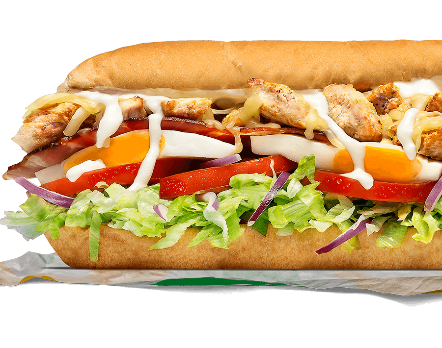 Subway® Chicken Caesar Sub with chicken, bacon, egg, salad, and Caesar dressing.