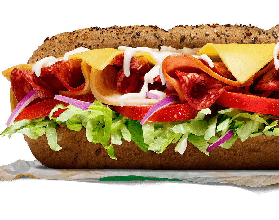Subway® Deli Supreme Sub with pepperoni, salami, ham, turkey, cheddar, salad & mayo.